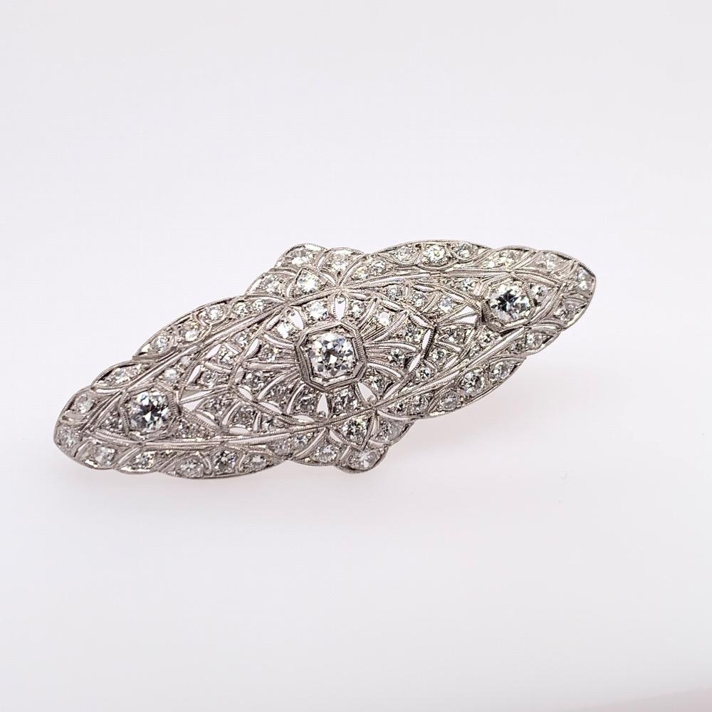 Round Cut Retro Platinum 4 Carat Natural Old Euro Round White Diamond Brooche, circa 1975 For Sale