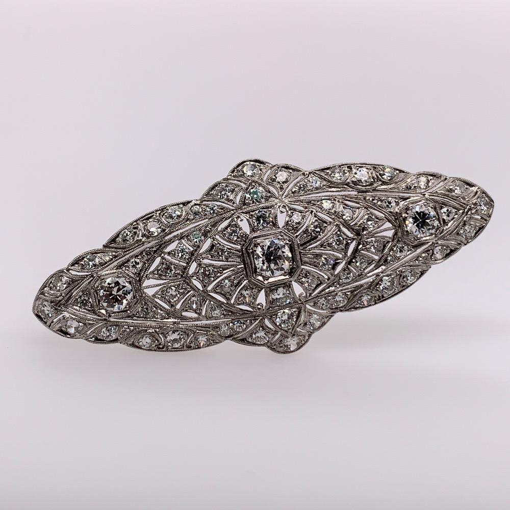 Retro Platinum 4 Carat Natural Old Euro Round White Diamond Brooche, circa 1975 For Sale 1