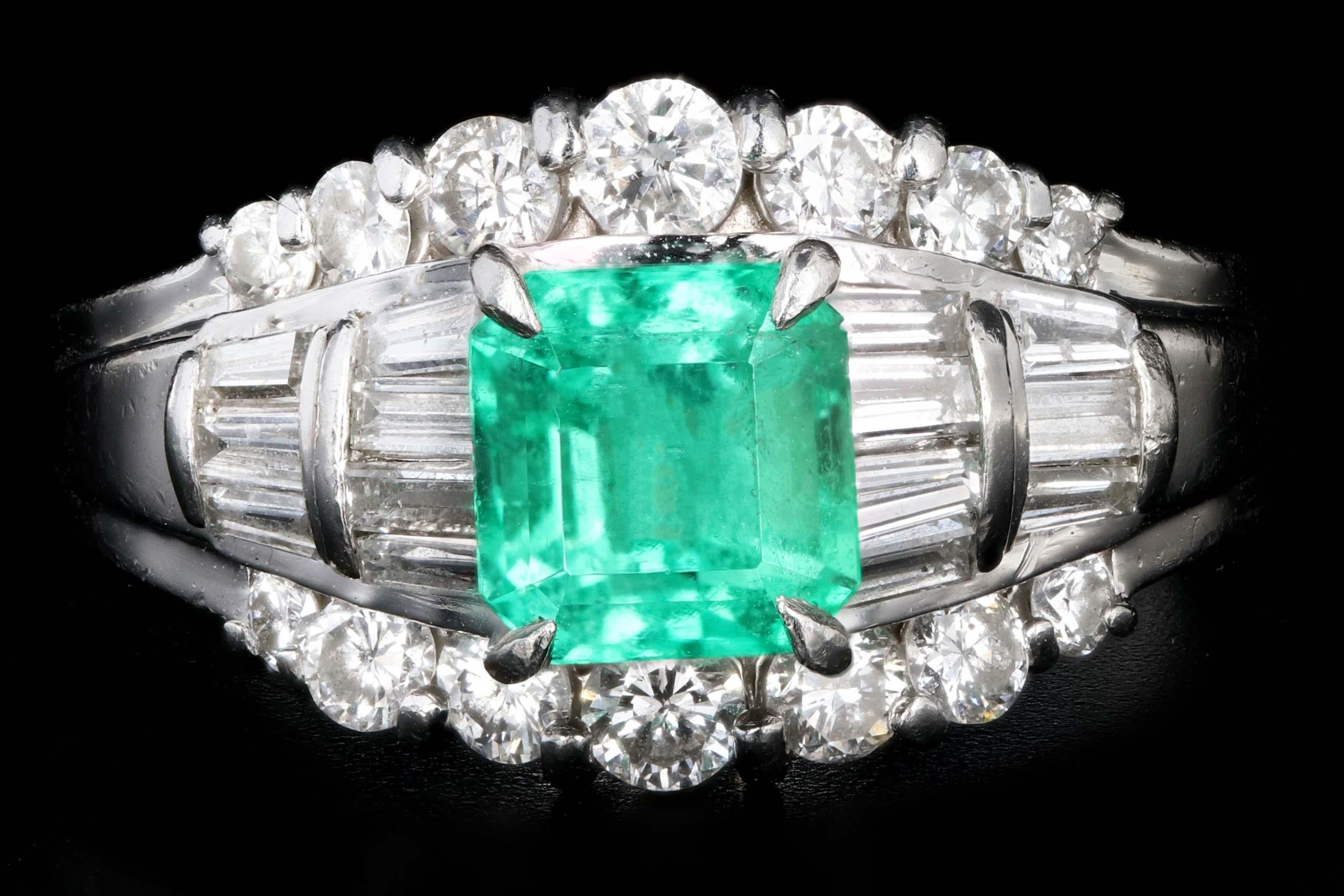 Era: Retro

Composition: Platinum

Primary Stone: Emerald

Carat Weight: .88 Carats

Accent Stone: Round Brilliant Cut & Baguette Cut Diamonds

Carat Weight: .85 Carats

Color: G-H

Clarity: Vs1/2

Total Carat Weight: 1.73 Carats

Ring Weight: 4.5