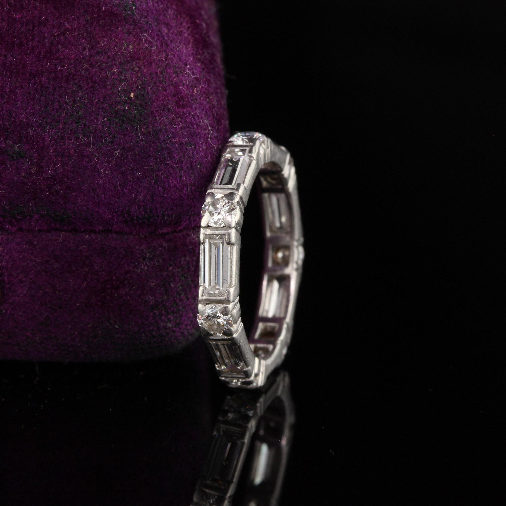 Gorgeous retro eternity band with baguette and round cut diamonds. 

Item #R0528

Metal: Platinum

Weight: 4.4 Grams

Total Diamond Weight: Approximately 3.00 cts

Diamond Color: G

Diamond Clarity: VS1

Ring Size: 6

*Unfortunately this ring cannot