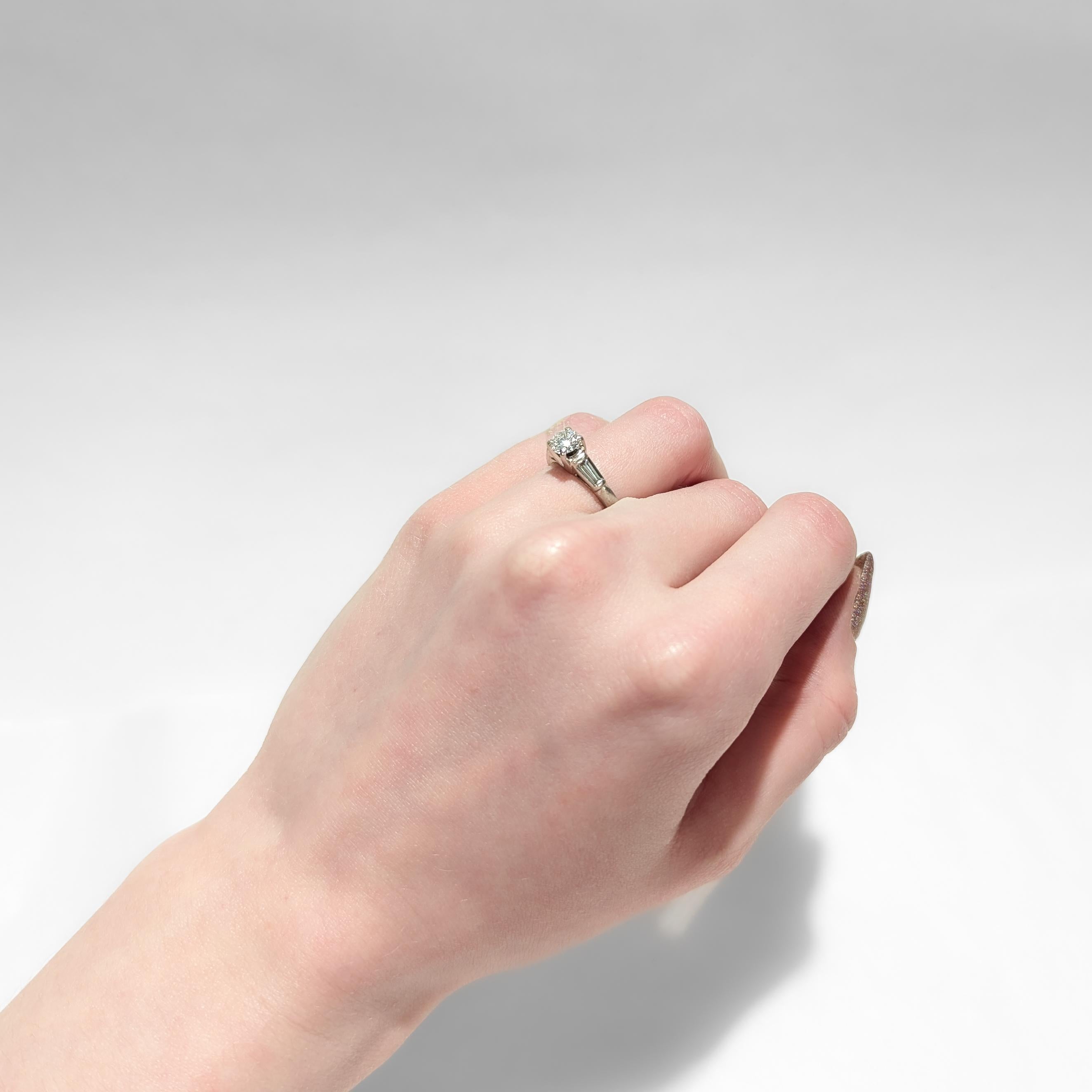 Retro Platinum Cathedral 0.74 Ctw Round Brilliant Cut Diamond Engagement Ring For Sale 11