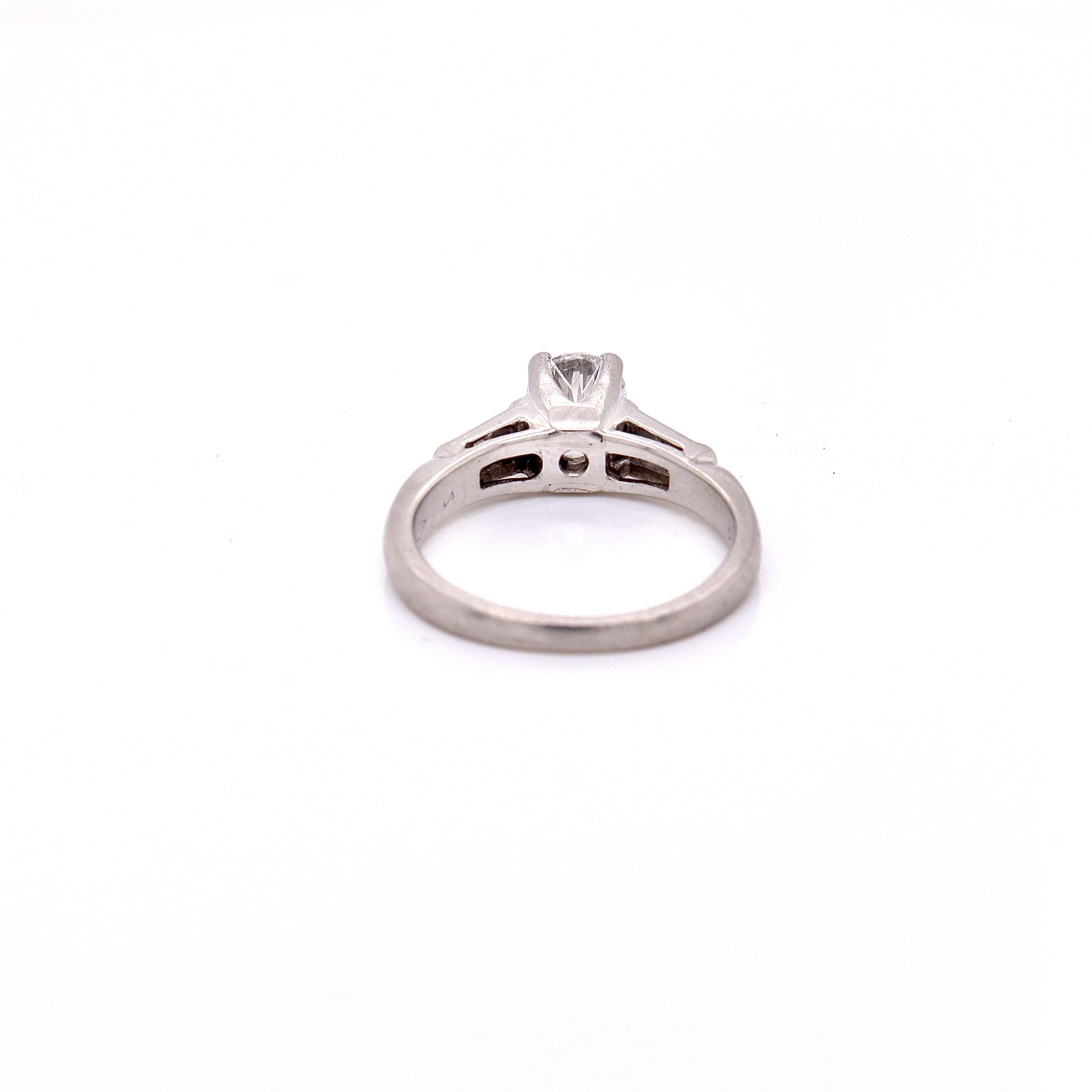 Women's Retro Platinum Cathedral 0.74 Ctw Round Brilliant Cut Diamond Engagement Ring For Sale
