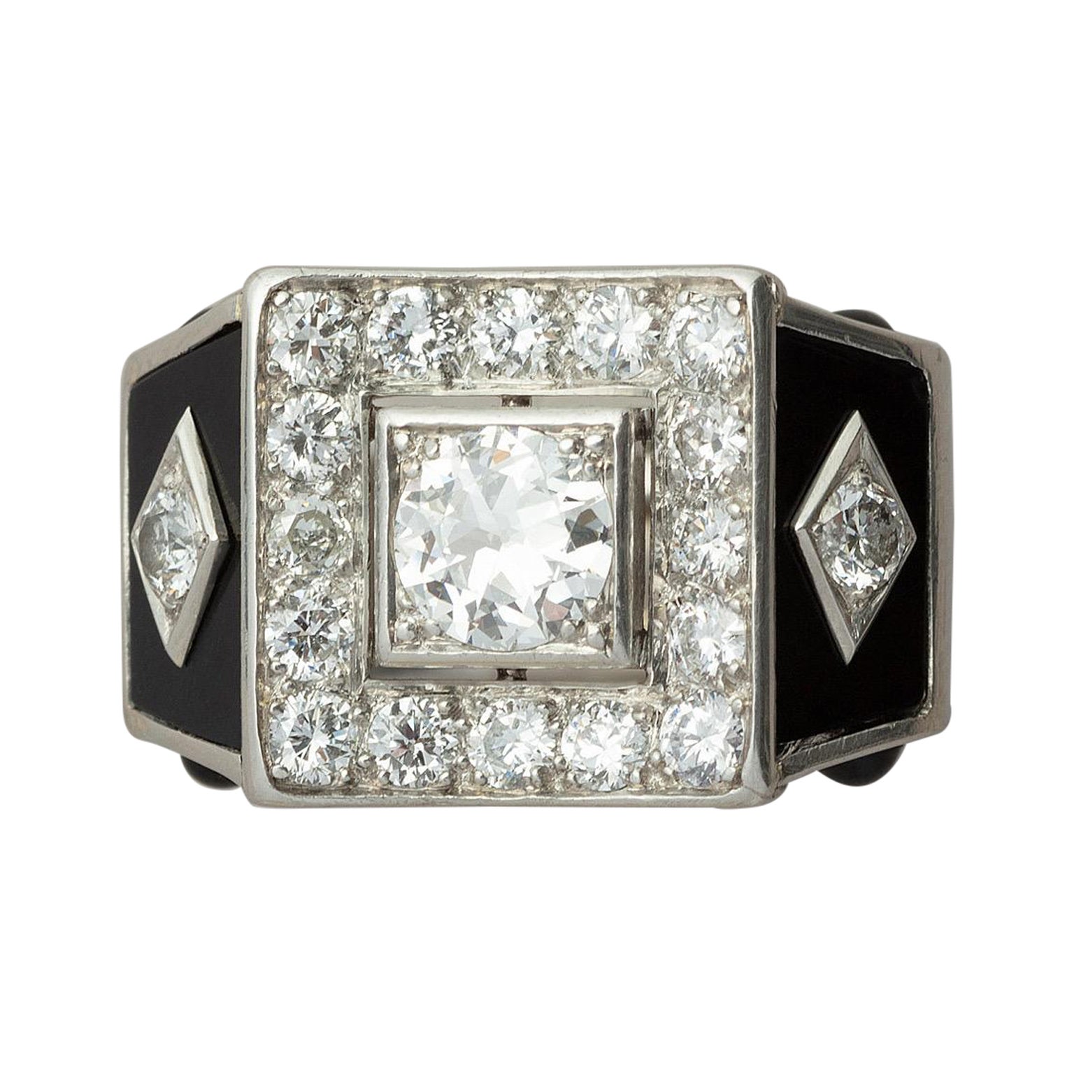 Bague rétro en platine, diamants et onyx