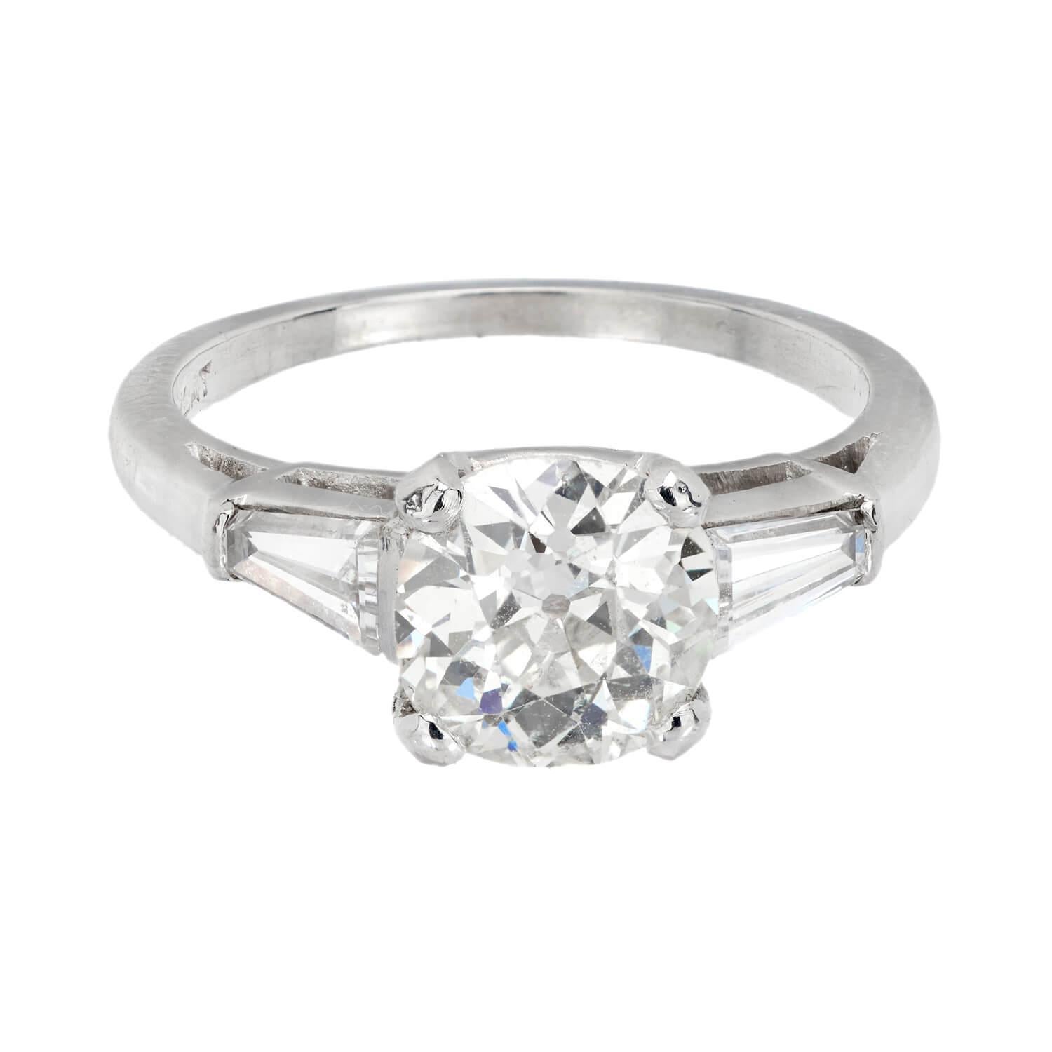 A beautiful diamond engagement ring from the Retro era (ca1940)! Crafted in platinum, this ring features a central old European cut diamond, which has a carat weight of 1.66ct and displays K/L color and SI1 clarity. The stone is held within a