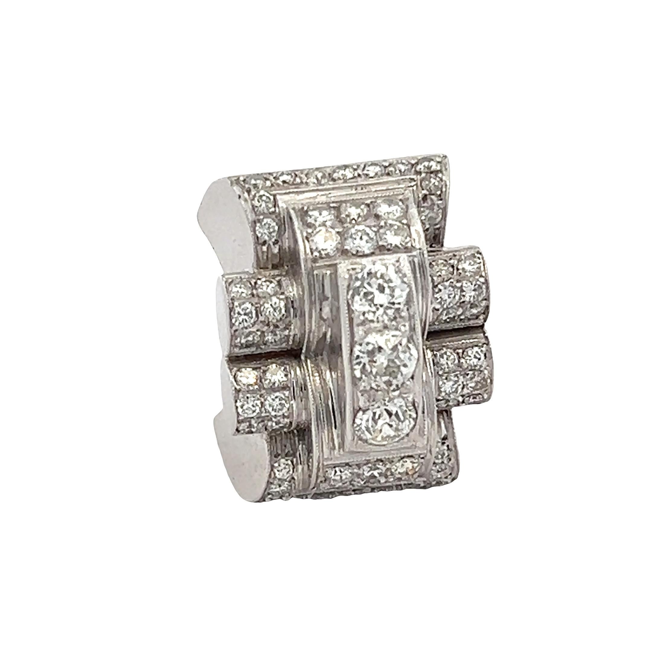 Bold and timeless, this vintage platinum diamond ring is a striking example of 1940s Retro design. Featuring approximately 3.00 carats of Old European cut diamonds, the ring showcases an architectural, stepped motif inspired by the Machine Age, with