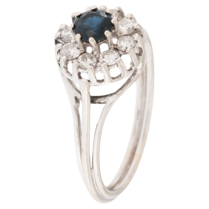 Retro Platinum Ring with Diamonds and Sapphire