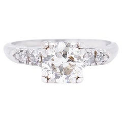 Bague de fiançailles rétro en platine et diamants ronds taille mixte 0,95 carat