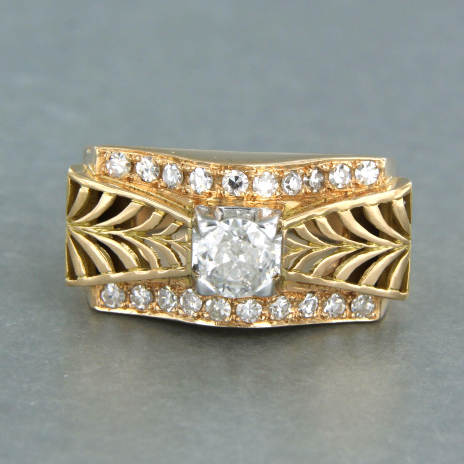 18k bicolor gold ring set with old mine cut and single cut diamonds. 0.90ct - F/G - Pique2, VS/SI - ring size U.S. 7.25 - EU. 17.5(55)

detailed description:

the top of the ring is 1.1 cm wide and 9.5 mm high

Ring size US 7.25 - EU. 17.5(55), can