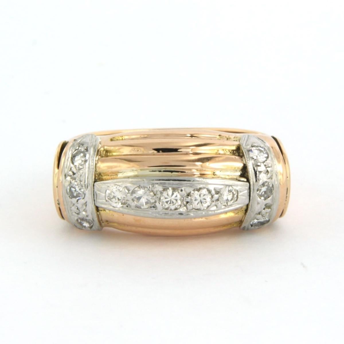 18 kt bicolor gold ring set with brilliant cut and single cut diamonds. 0.20 ct - F/G - VS/SI - ring size U.S. 7.25 - EU. 17.5(55)

detailed description:

the top of the ring is 1.0 cm wide

Ring size U.S. 7.25 - EU. 17.5(55), ring can be enlarged
