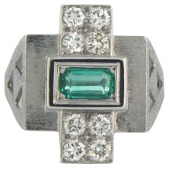 Anello RETRO con smeraldo e diamanti taglio brillante fino a 0,50 carati in oro bianco 18 ct.