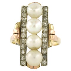 Bague RETRO avec perles et diamants taille ancienne jusqu
à 0,80ct or 14k 6,2 grammes