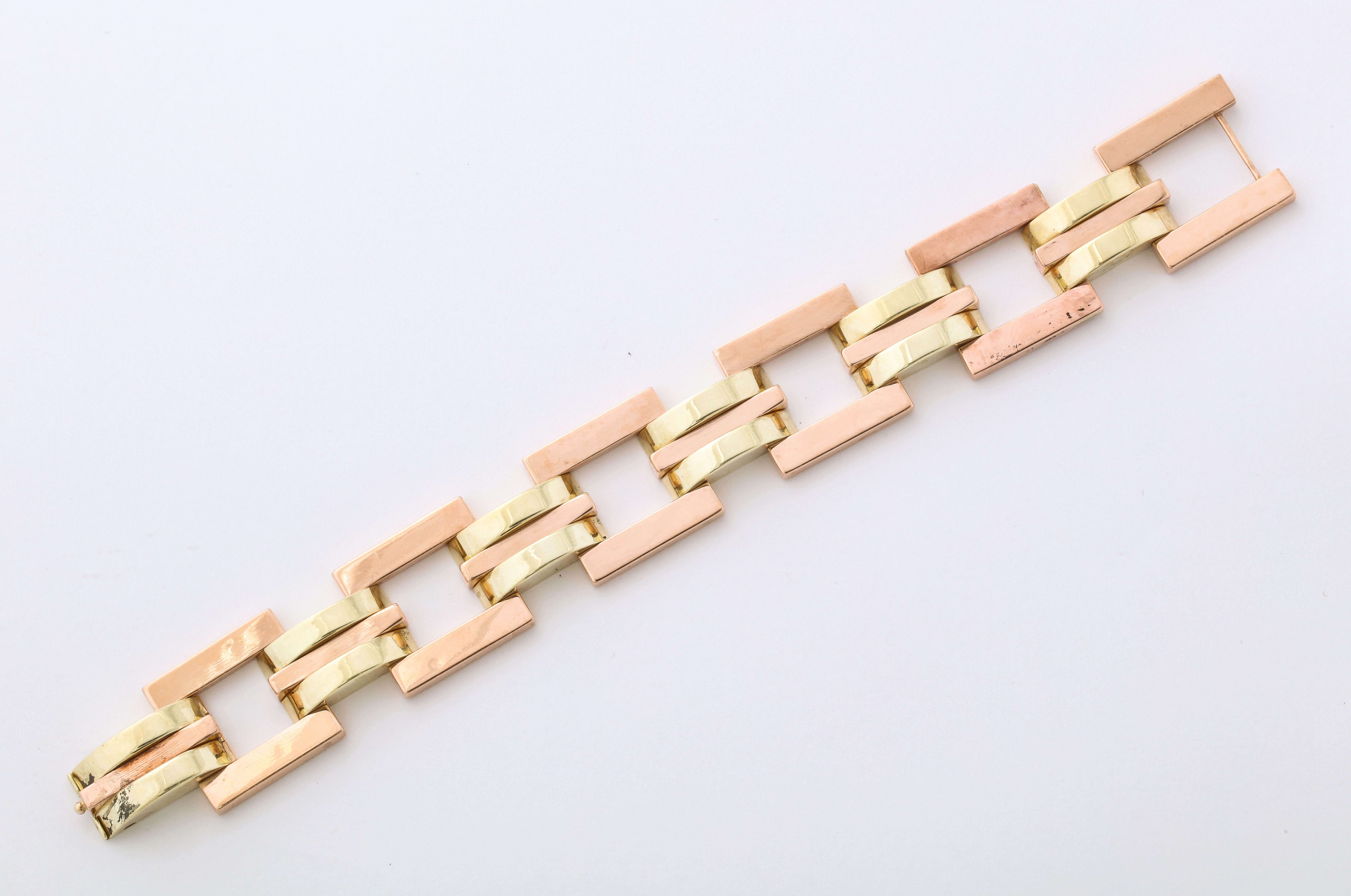 This Retro two color Gold Bracelet is an exceptional design with square and rectangular links.
It is beautifully made and looks great on it's own or worn with another bracelet.