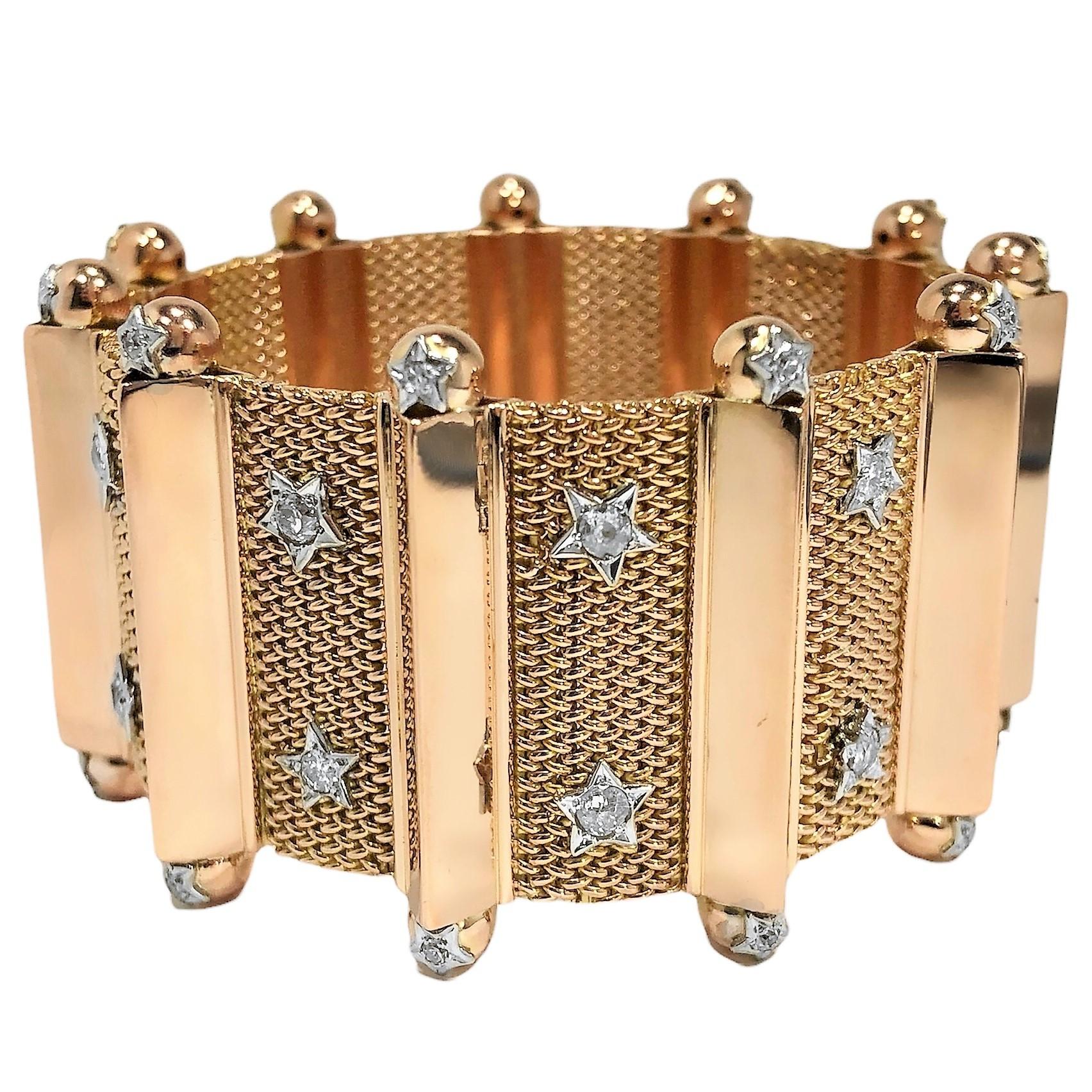 This 1 1/2 inch wide architectural style 18k rose gold flexible bracelet is a very interesting blend of geometric symmetry with whimsy. It is generously adorned with forty-six platinum stars that are set with diamonds, having a total approximate