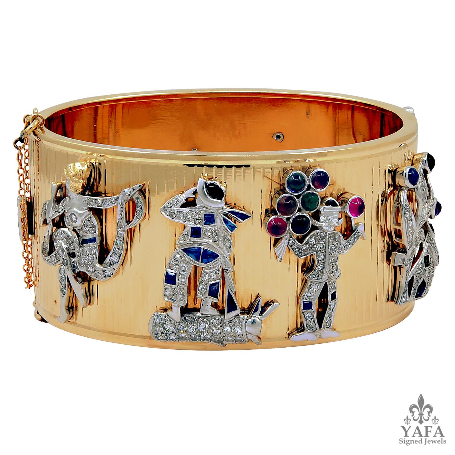 Retro Rose Gold Charm Bracelet
A retro 14k rose gold clown motif charm bangle, set with diamonds, sapphire, ruby and emerald, circa 1940s.
inner-circumference approximately 7″ in length by 1.25″ in width
