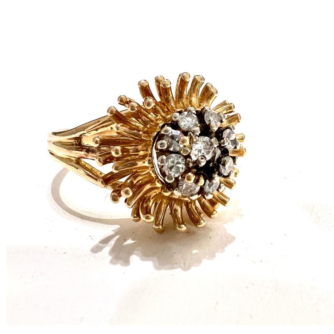 Introducing a truly exceptional piece of jewelry: the retro Rosette Design Ring crafted from 18-karat yellow gold with platinum accents. Adorned with exquisite single-cut diamonds totaling 0.27 carats, this ring is a testament to timeless elegance