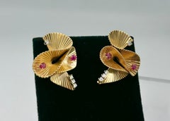Retro Ruby Diamond Earrings 14 Karat Gold Mid-Century Modern Ribbon Motif