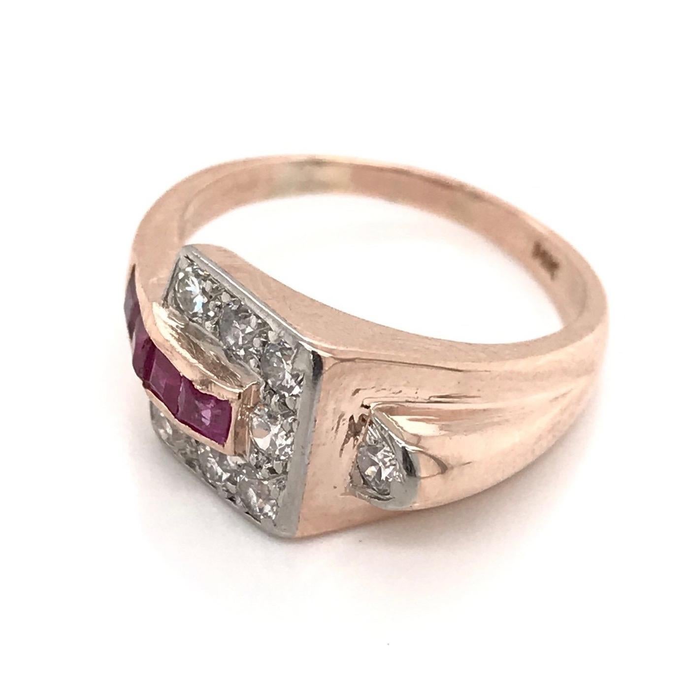 This extravagant Retro piece was crafted sometime during the Mid Century design period ( 1940-1960's ). The setting is 14k rose gold and features four richly hued french cut rubies, eight sparkling diamond accents, and subtle white gold accents.
