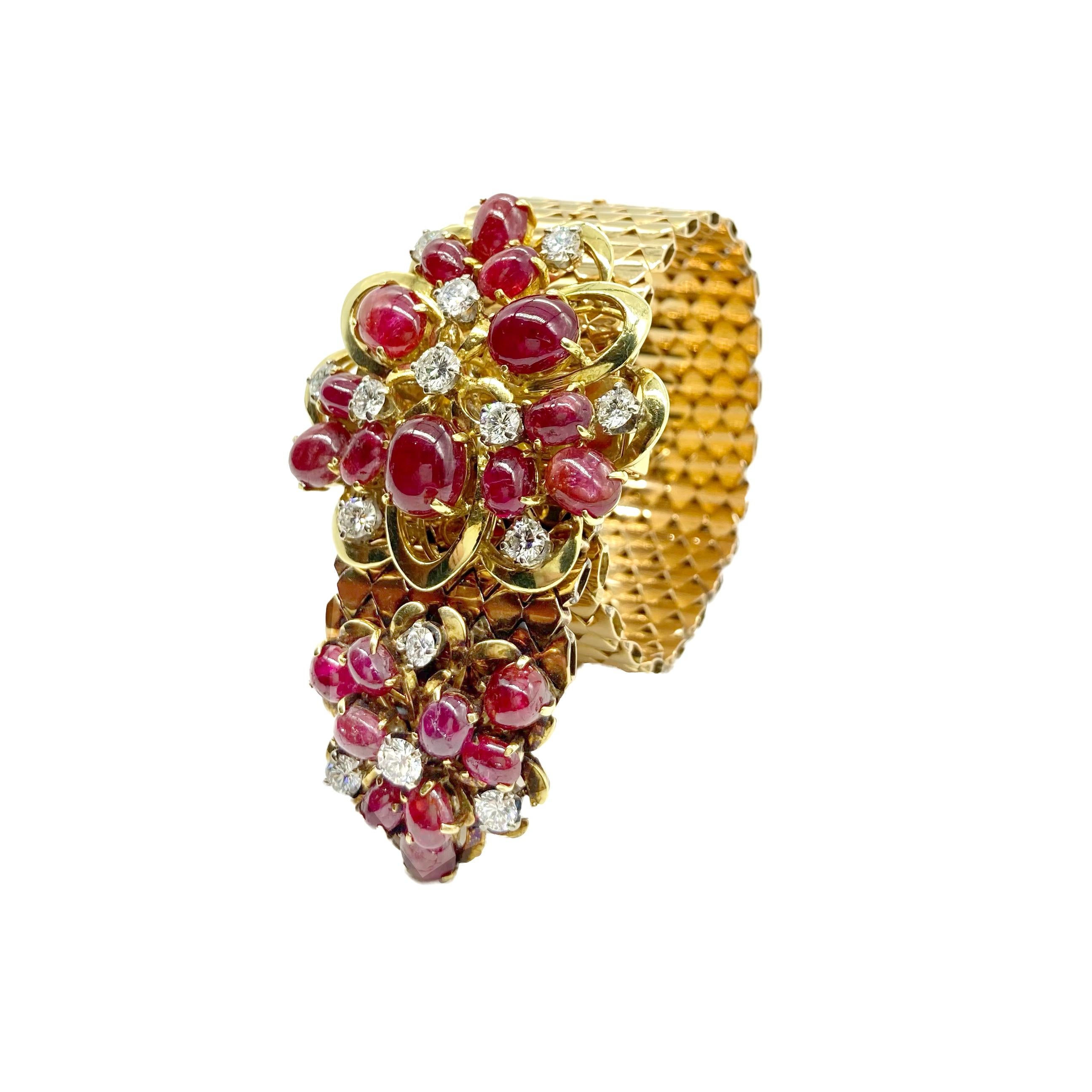 A retro adjustable slide bracelet in 18 karat yellow gold with 14 round diamonds (app. 3.15 cts) and 21 oval cabochon rubies. Made in France, circa 1940.  
