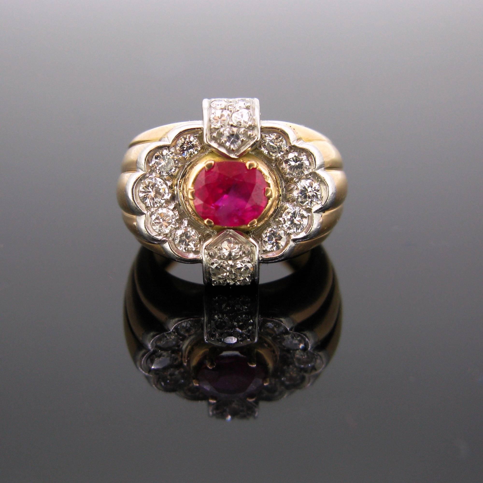 This Vintage Retro ring features a beautiful luscious ruby surrounded with diamonds. The natural ruby is from Burmese with no indication of heating. It weighs around 1.40ct and it goes with a gemological report nºCGL15663 (nov 2017). They are 6