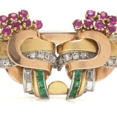 Broche rétro à double clip avec rubis, émeraudes et diamants, en or 18 carats
