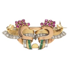 Broche rétro à double clip avec rubis, émeraudes et diamants, en or 18 carats