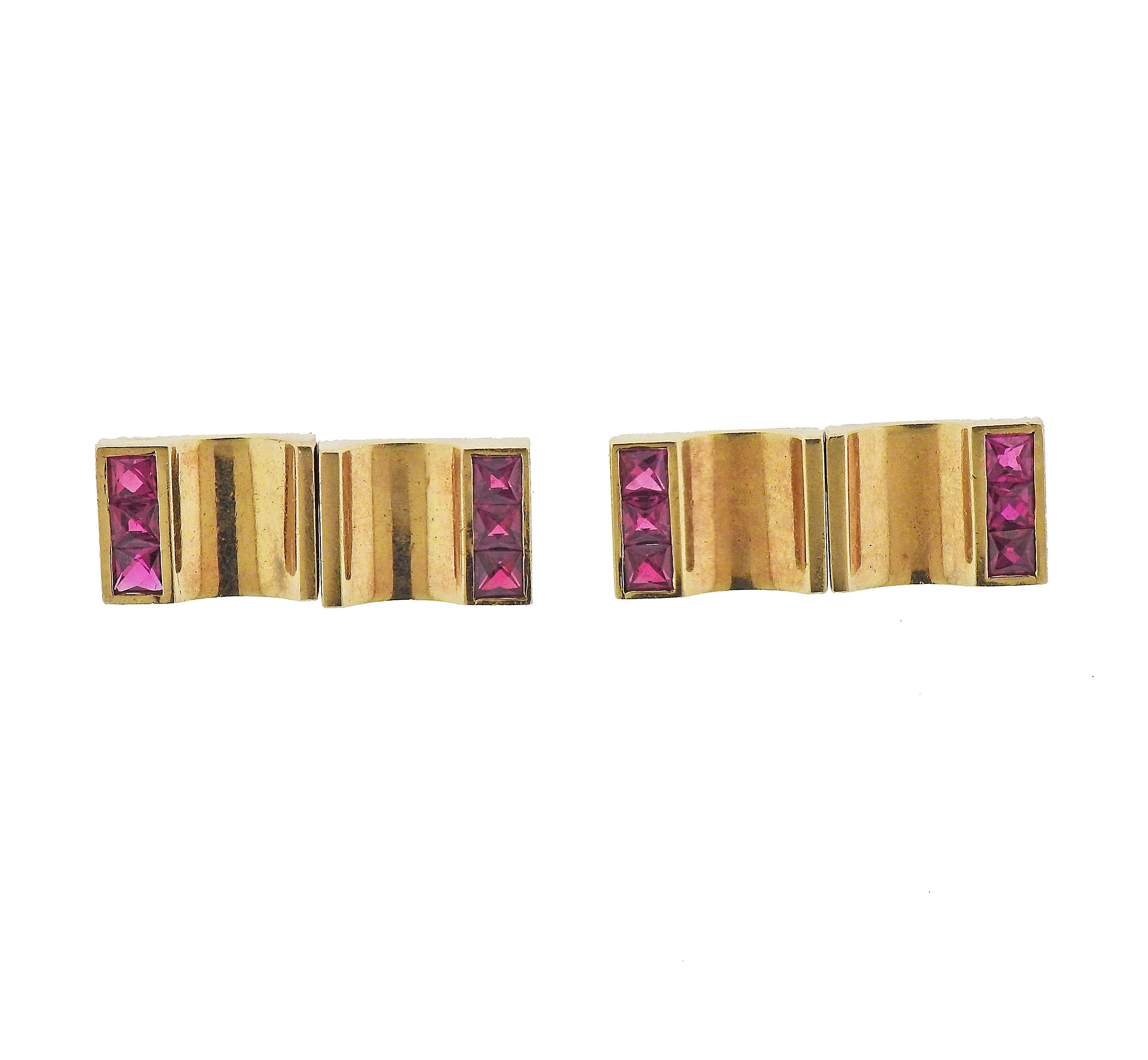 Pair of Retro 14k rose gold cufflinks with French cut rubies. Each top is 14mm x 10mm. Marked 14. Weight - 15.5 grams.