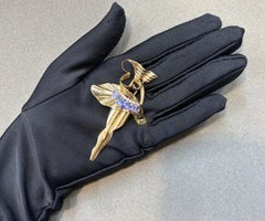 Broche rétro en saphir et diamants