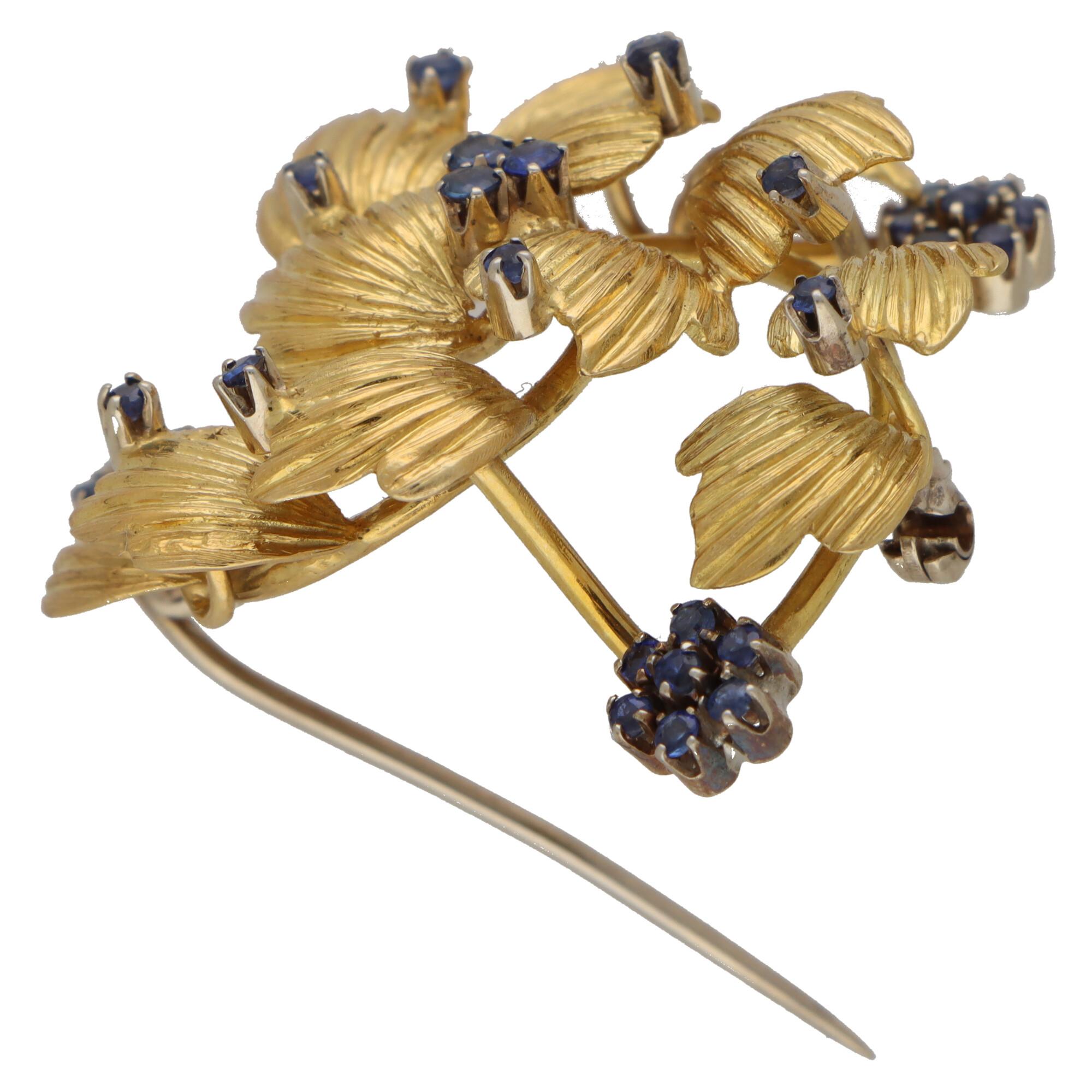 Round Cut Retro Sapphire Floral Swirl Brooch Set in 18k Yellow and White Gold
