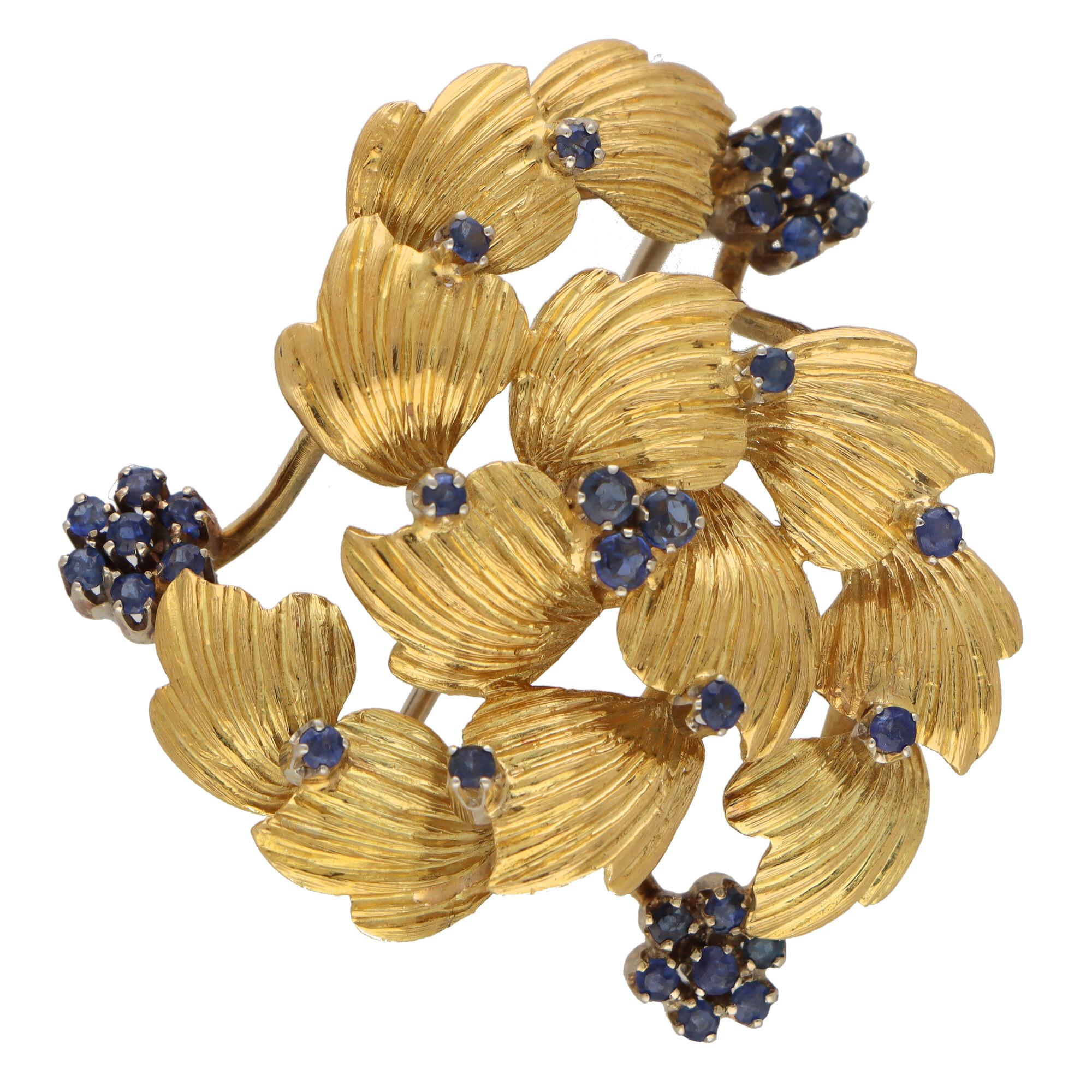 Retro Sapphire Floral Swirl Brooch Set in 18k Yellow and White Gold In Good Condition In London, GB