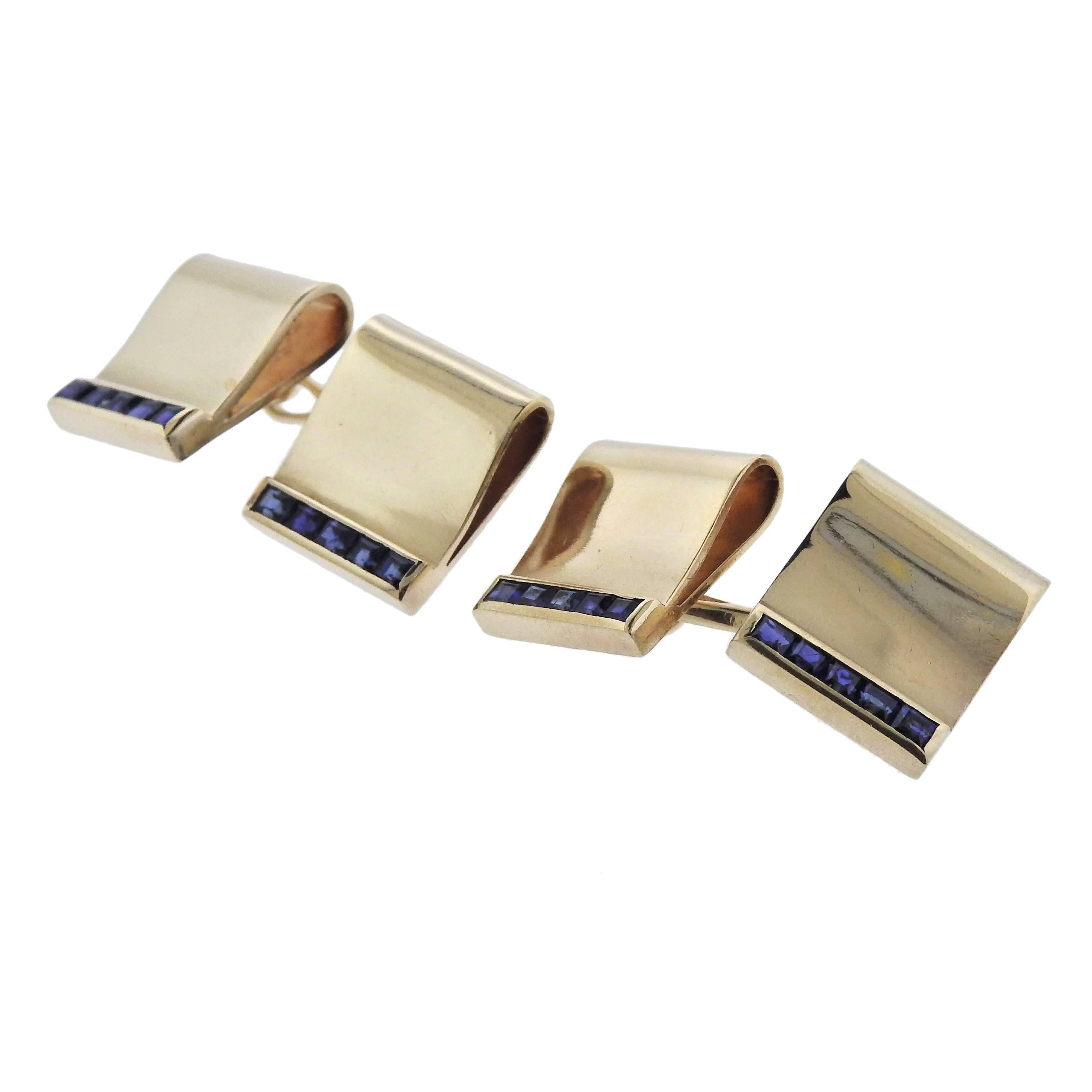 Pair of 14k gold Retro cufflinks, adorned with blue sapphires. Each top is 14mm x 12mm, weigh 13.9 grams. Marked: 14k.