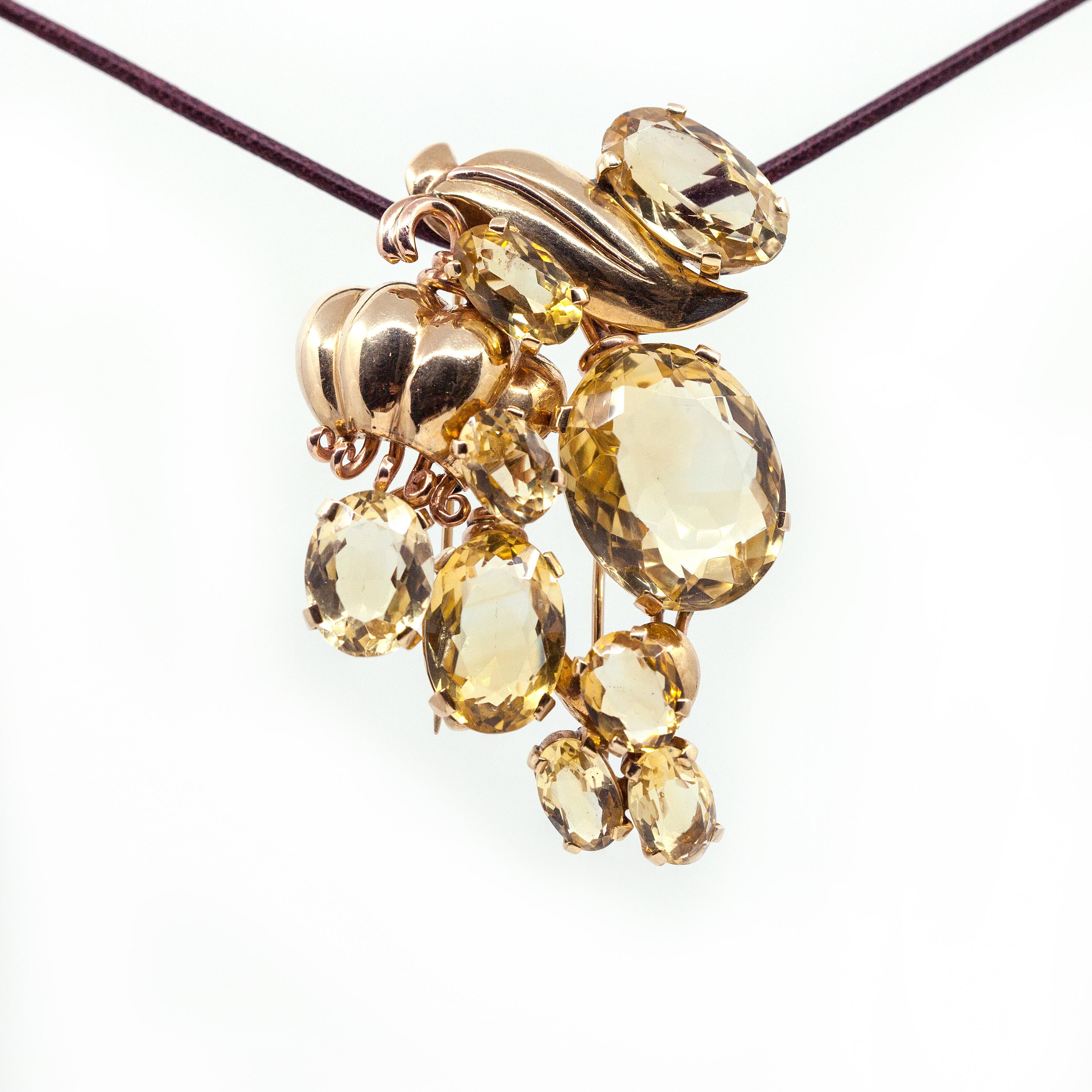 Stunning Large SEAMAN SCHEPPS Retro Fur Clip Brooch in 14K yellow gold, 2-pin clasp flower & leaf over a bunch of 9 oval Citrine, Open back setting

Approximate Measurements:
Overall 70.6mm x 52.8mm  (2.78