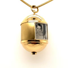 Retro Seven Picture Spinner Locket