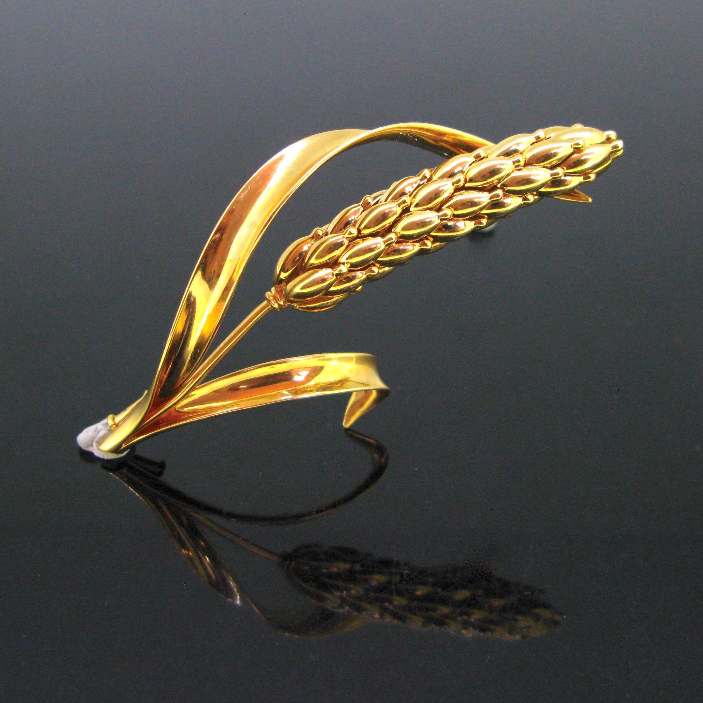Weight:	23gr


Metal:	18kt yellow gold 


Condition:	Very Good


Hallmarks:	French, the eagle’s head
			Maker’s mark: E / horseshoe/ B


Comments:	This lovely sheaf of wheat pin brooch is from the Retro era, circa 1950. It is made in 18kt yellow