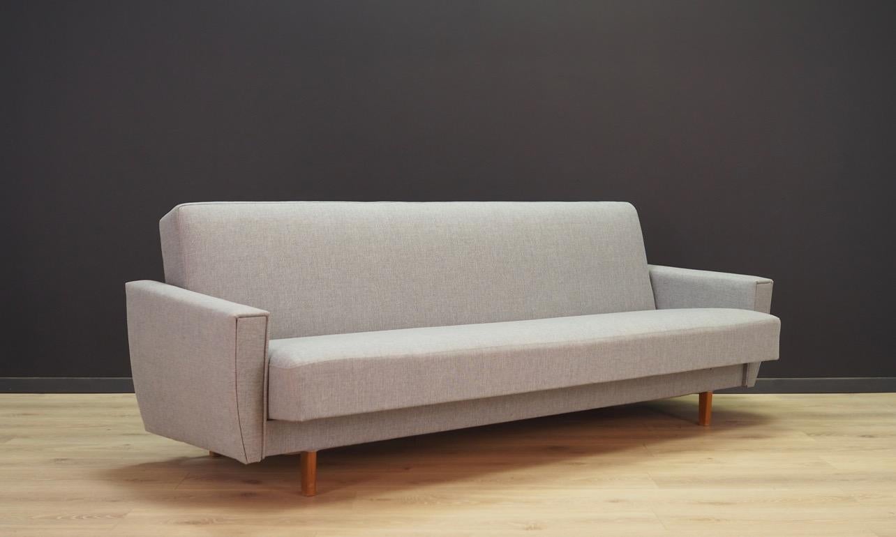Classic sofa from 1960s-1970s., Scandinavian design. Upholstery after replacement in lightgrey. Preserved in good condition - directly for use.

Dimensions: height 77 cm, width 204 cm, depth 80 cm, seat 185 cm x 57 cm seat height 40 cm height