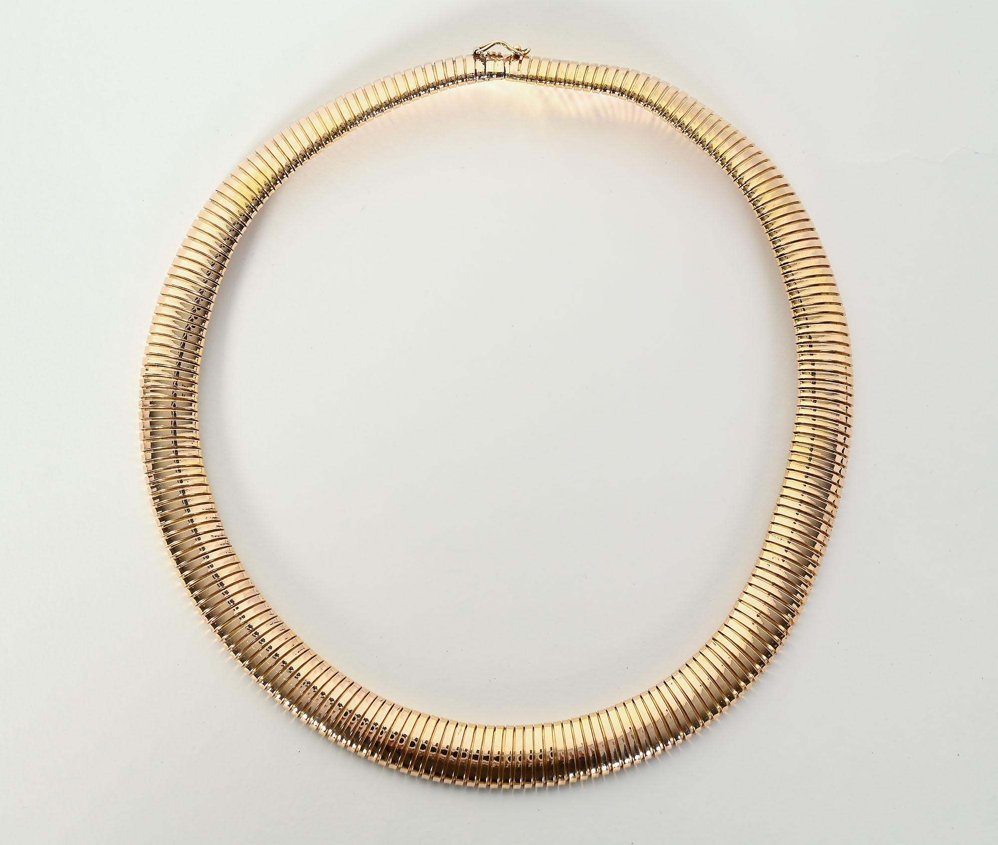 This springy coil necklace, most popular in the Retro era, also goes by the unfortunate name of gas pipe. The name is so unappealing that I could not put it in the title. This in no way reflects upon the beauty of the necklace. This example is wider