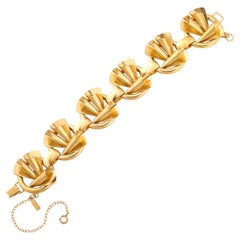 Bracciale retrò in argento e oro lavato con sculture geometriche a forma di rotolo
