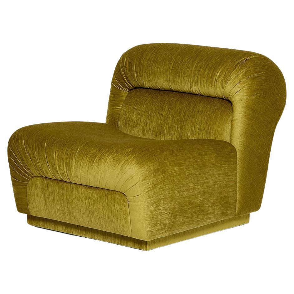 Retro Style Armchair With Curved Form and Pleated Details For Sale