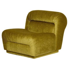 Retro Style Armchair With Curved Form and Pleated Details
