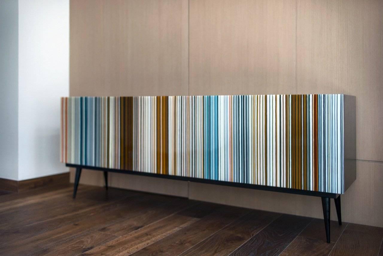 The Buff-Heyyy is a retro style credenza designed by Orfeo Quagliata in collaboration with Taracea Furniture. An object of fused glass created with the exclusive barcode technique. The Buff-Heyyy´s retro design mixed with designer's exceptional