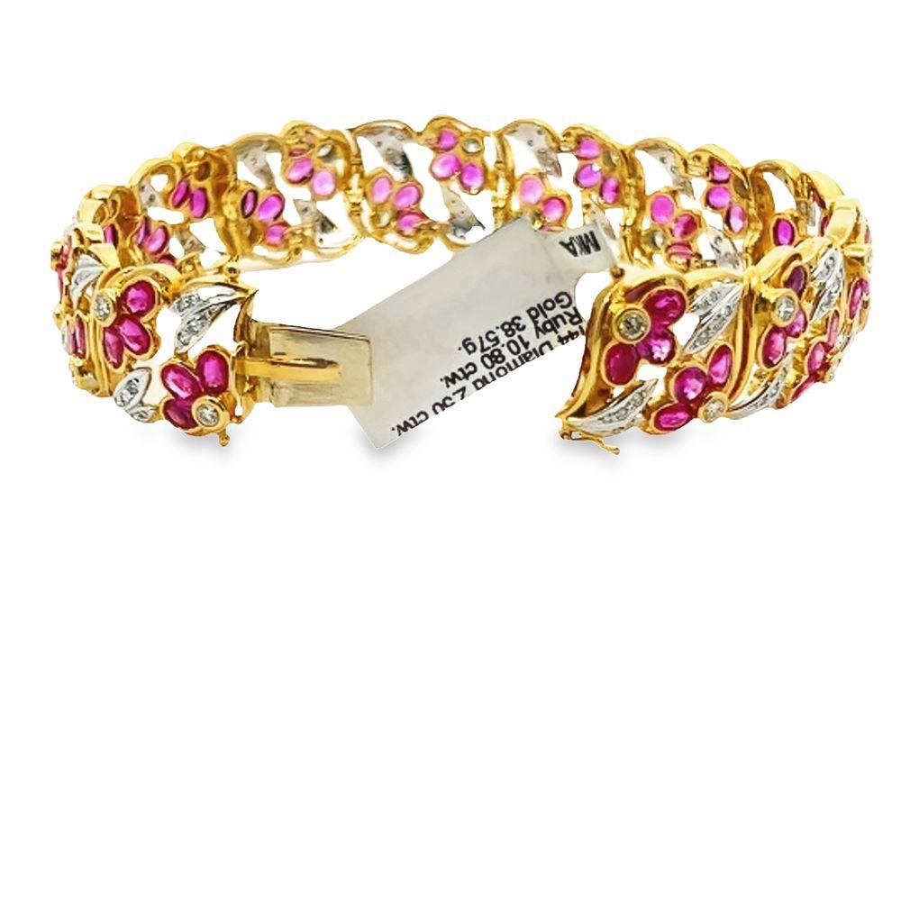 Oval Cut Ruby and Diamond Yellow Gold Retro Bracelet For Sale