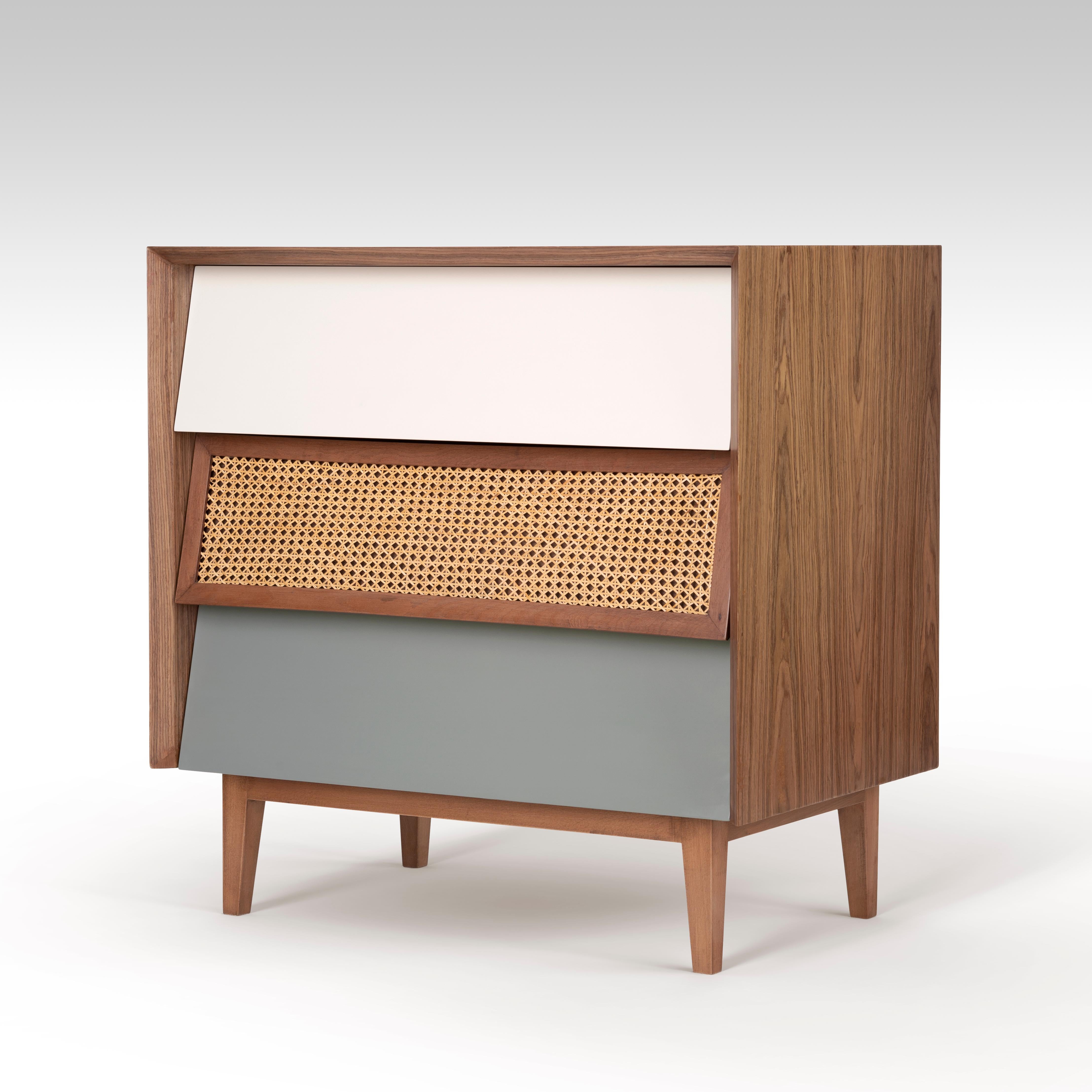 Retro style walnut wood chest of drawers with cané and lacquered drawers.
Add elegance to your bedroom with our RETRO CANÉ chest of drawers. The lines are reminiscent of the beloved 1960’s and the cané mesh is a beautiful revival of French vintage,