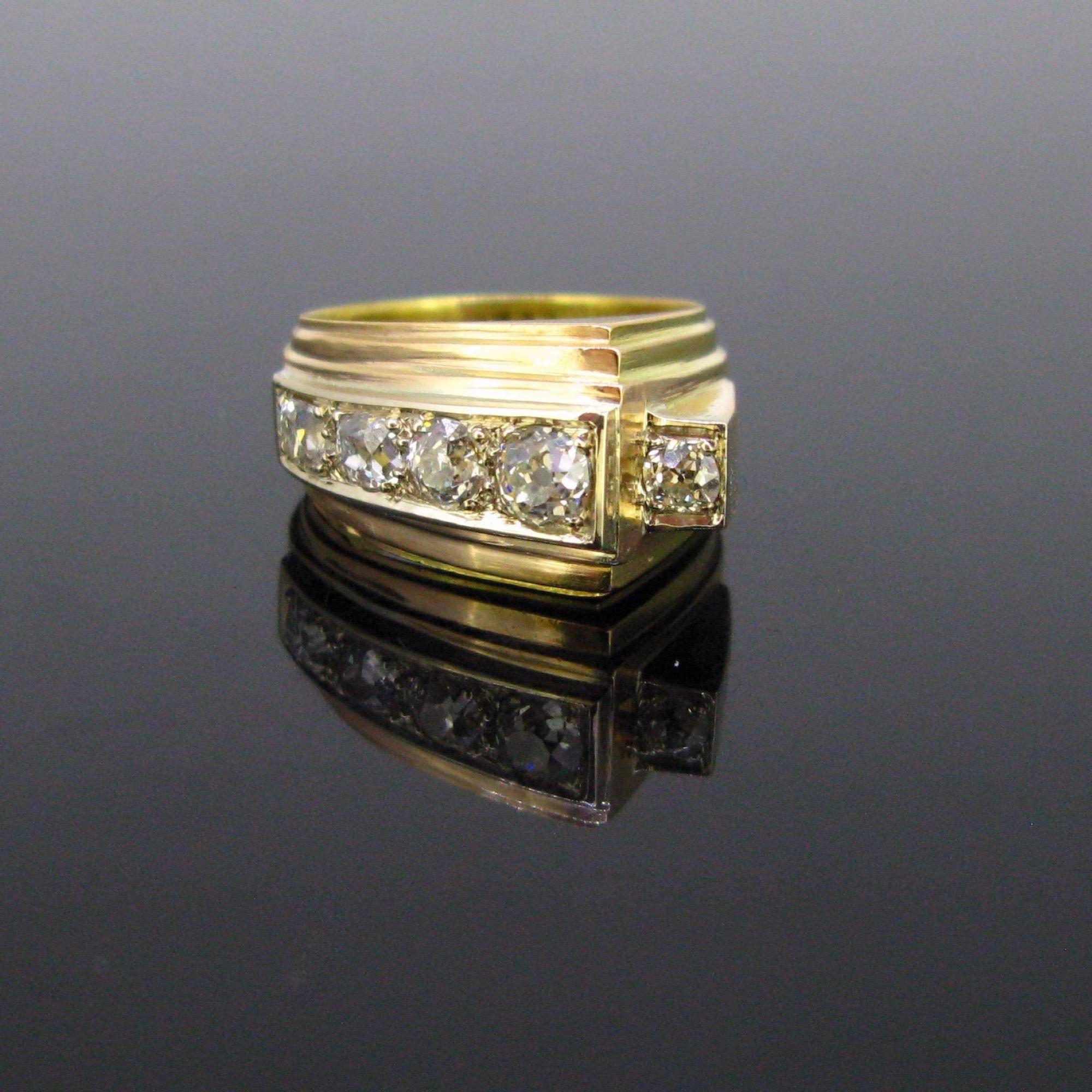 Weight:	9,8gr

Metal:	18kt yellow and rose Gold 
	Platinum

Stones:	5 diamonds
•	Total carat weight:	1.50ct approximately
•	Cut:	Old mine 
•	Colour:	H –I
•	Clarity:	VS-SI


Condition:	Very Good


Comments: 	This ring is from the Retro period. It is
