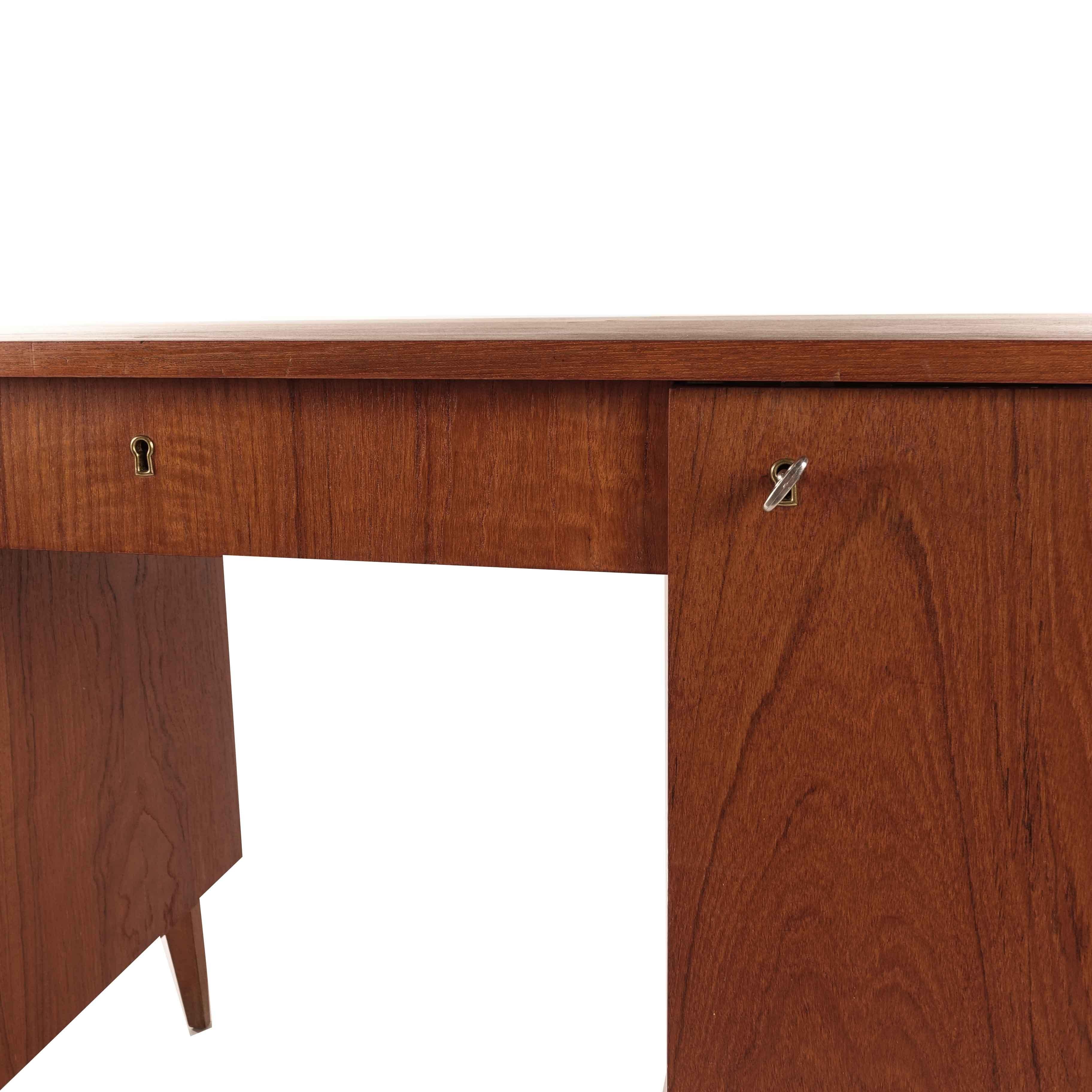 Beautiful desk in original design from Sweden midcentury with one middle drawer and two compartments with shelves.