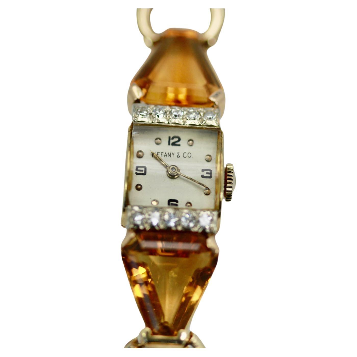 This beautiful watch is from the Tiffany studios with a Movado factory 17 jewel movement.  Case marked Movado USA, 20.6 grams, wrist size 6.5, face 12mm each Citrine over 5.00 Carats each.
Currently at watch maker for service.