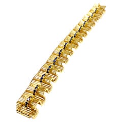 Retro Tiffany & Co. Round Sapphire and 18 Karat Gold Ribbon Bracelet