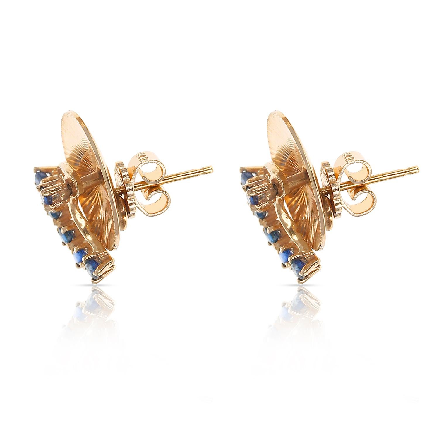 A pair of Tiffany & Co. Spinning Blue Sapphire Earrings made in 14 Karat Yellow Gold.  The total weight is 6.40 grams. 
Length: 1.80