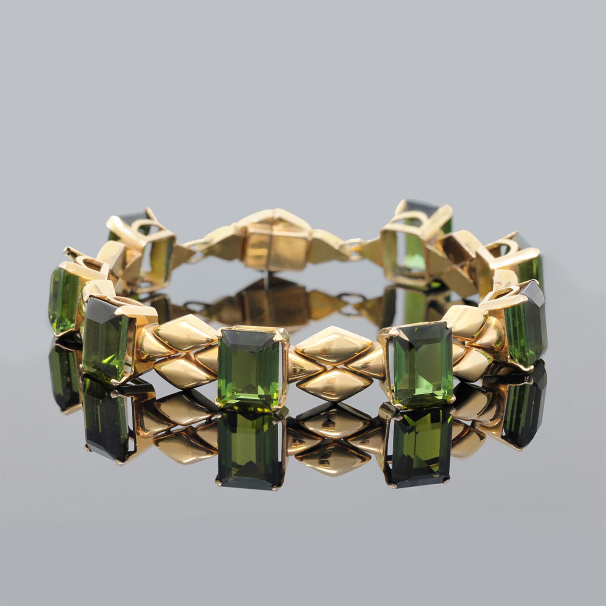 Retro 18 karat pink gold and tourmaline bracelet and earrings, the bracelet of polished pink gold lozenge-shaped links spaced by emerald-cut tourmalines weighing approximately 56.00 carats, gross weight 34.6 grams, length 8 inches, width ½ inch, the