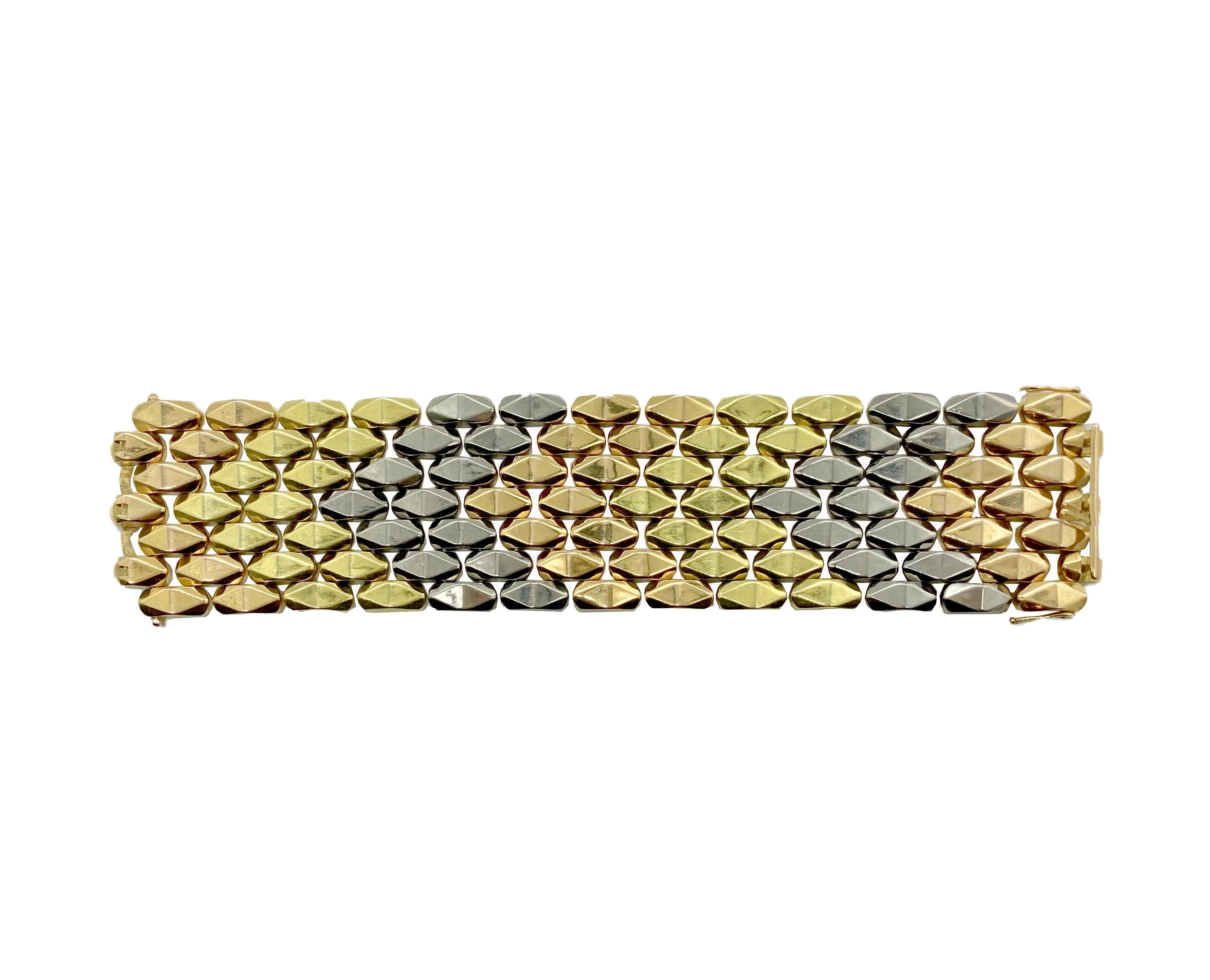 A substantial tri-color 18 karat yellow gold bracelet circa 1940s. Made in Italy.