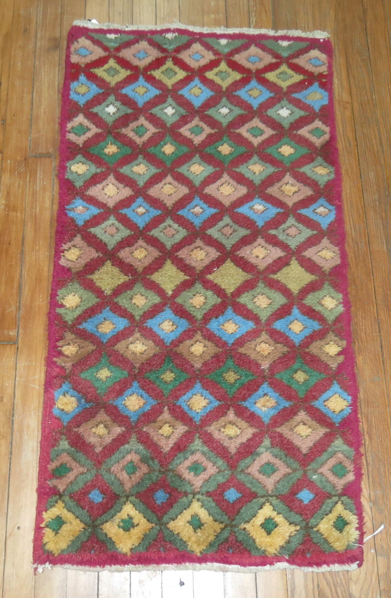 Small size Raspberry field color Turkish deco rug.

2'1'' x 4'