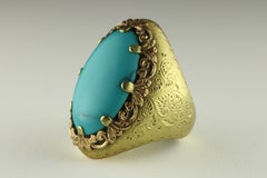 Retro Turquoise Oval Cabochon and 18K Gold Cocktail Ring